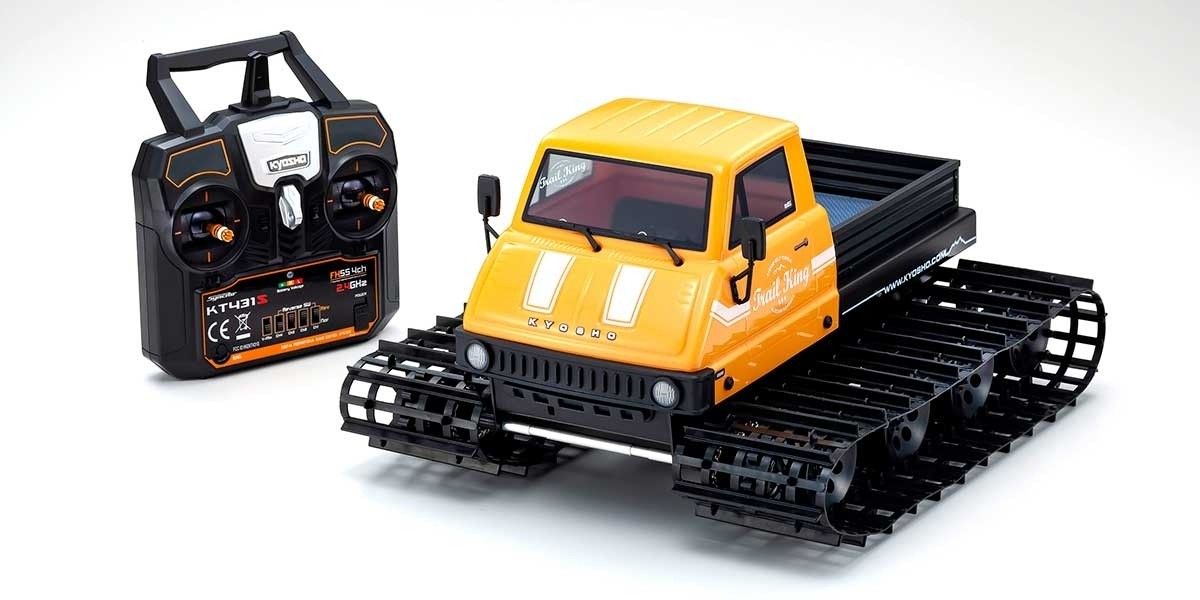 kyosho-34903T1-1-Trail-King-Raupenfahrzeug-Pistenraupe-Blizzard-2-0-RTR-readyset-mit-Fernsteuerung-orangegelb kyosho-34903T1-1-Trail-King-Raupenfahrzeug-Pistenraupe-Blizzard-2-0-RTR-readyset-mit-Fernsteuerung-orangegelb