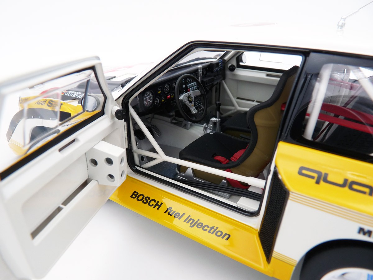 autoart-88503S-5-Audi-S1-Sport-Quattro-Gruppe-B-Winner-Rally-San-Remo-1985-Walter-Röhrl-Christian-Geistdörfer-mit-Figur-Vitrine-limited