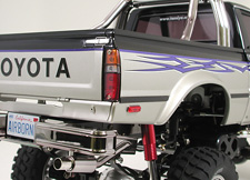 tamiya58397-6-Toyota-Hilux-High-Lift-Surfboard