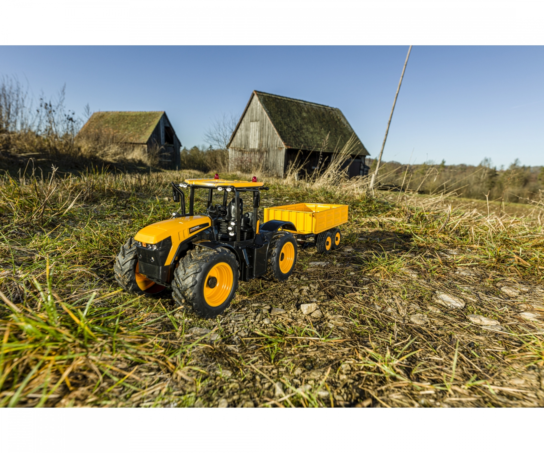 carson-500907654-4-RC-Traktor-JCB-Fastrac-mit-landwirtschaftlichem-Anhänger-ferngesteuert-Trecker-mit-Hänger-zum-Spielen carson-500907654-4-RC-Traktor-JCB-Fastrac-mit-landwirtschaftlichem-Anhänger-ferngesteuert-Trecker-mit-Hänger-zum-Spielen