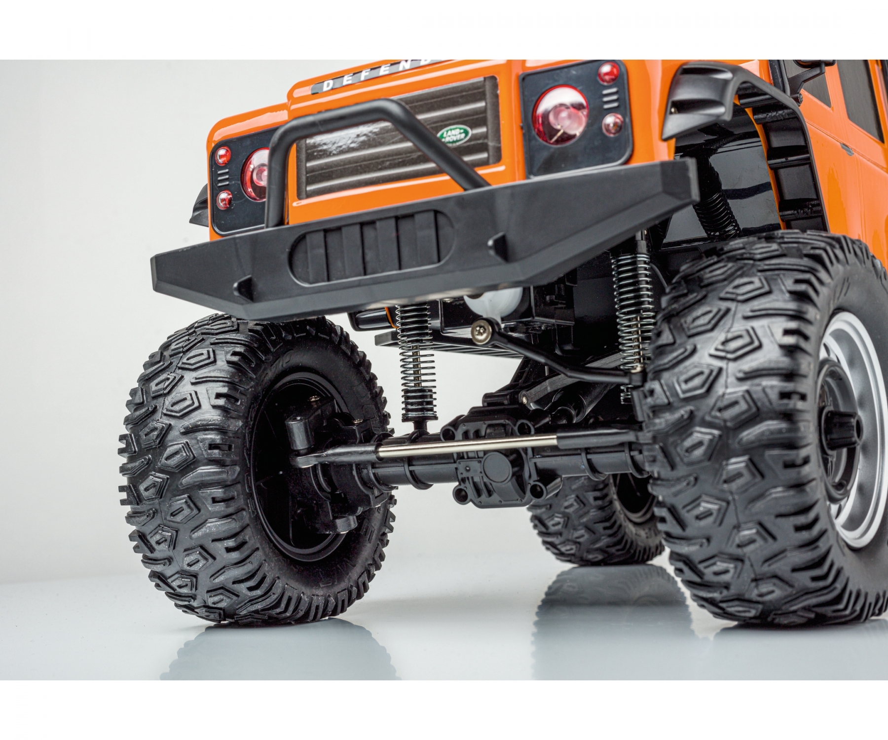 carson-500404171-4-Land-Rover-Defender-100-RTR-orange-Rock-Crawler-Portalachsen