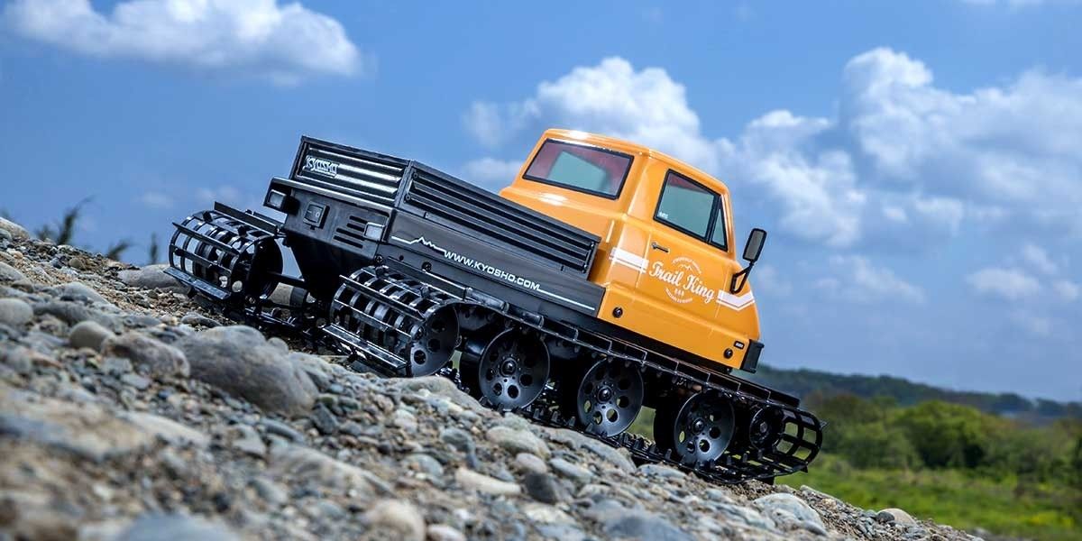 kyosho-34903T1-9-Trail-King-Raupenfahrzeug-Pistenraupe-Blizzard-2-0-RTR-readyset-mit-Fernsteuerung-Gelände-Kies kyosho-34903T1-9-Trail-King-Raupenfahrzeug-Pistenraupe-Blizzard-2-0-RTR-readyset-mit-Fernsteuerung-Gelände-Kies