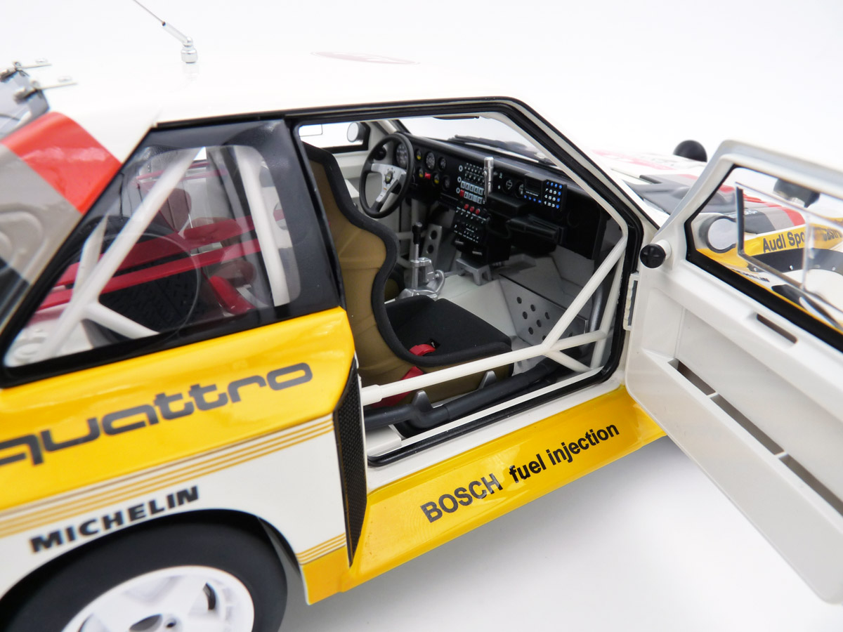 autoart-88503S-6-Audi-S1-Sport-Quattro-Gruppe-B-Winner-Rally-San-Remo-1985-Walter-Röhrl-Christian-Geistdörfer-mit-Figur-Vitrine-limited