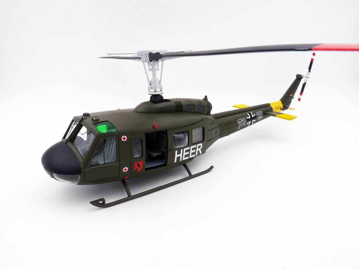 schuco-4500912500-1-Bell-UH-1D-Huey-Heer-Teppichklopfer-Heeresflieger